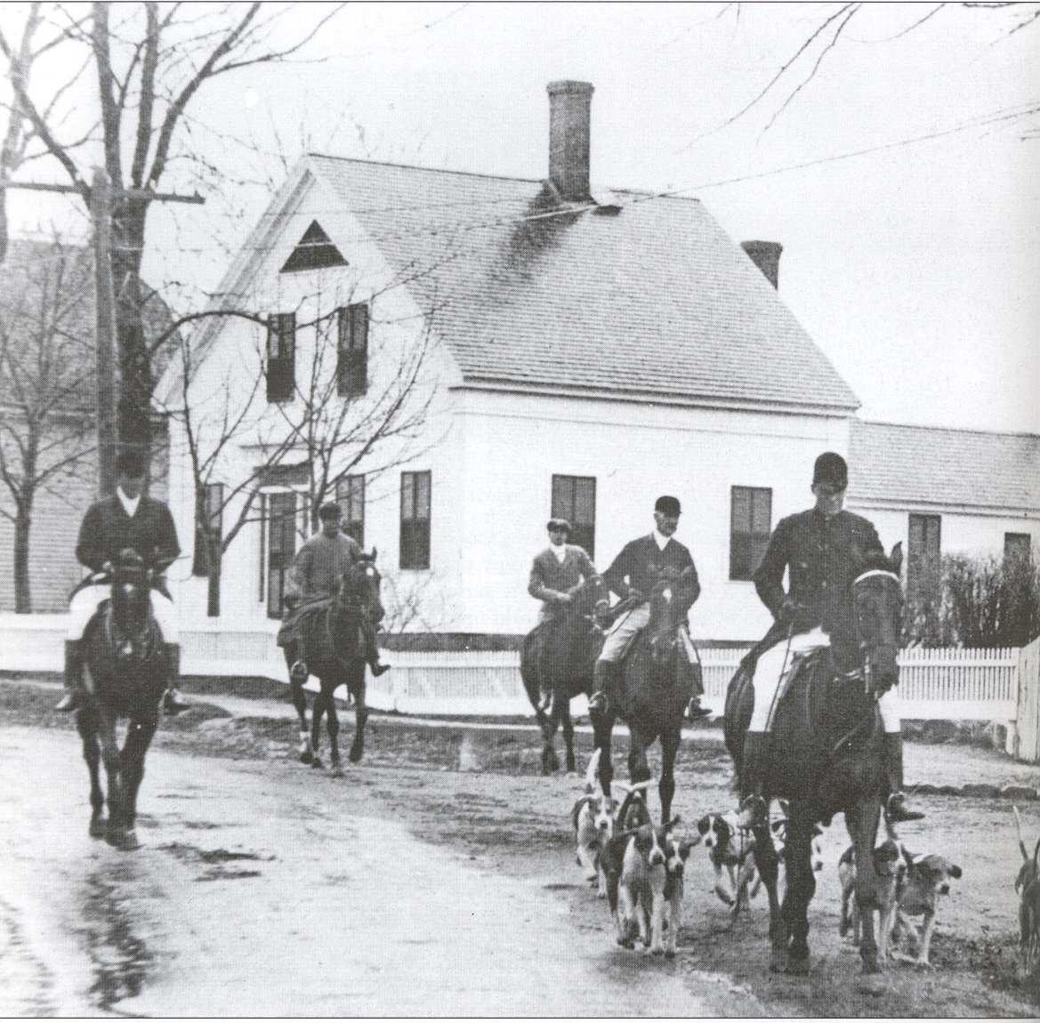Image of a group of hunters riding on horseback in the 1930s at Cape Cod's most luxurious resort & spa