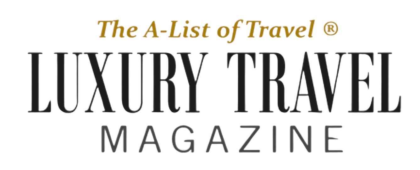 Luxury Travel Magazine logo with gold and black text.