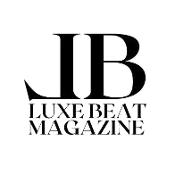 Logo of Luxe Beat Magazine with stylized initials "LB".