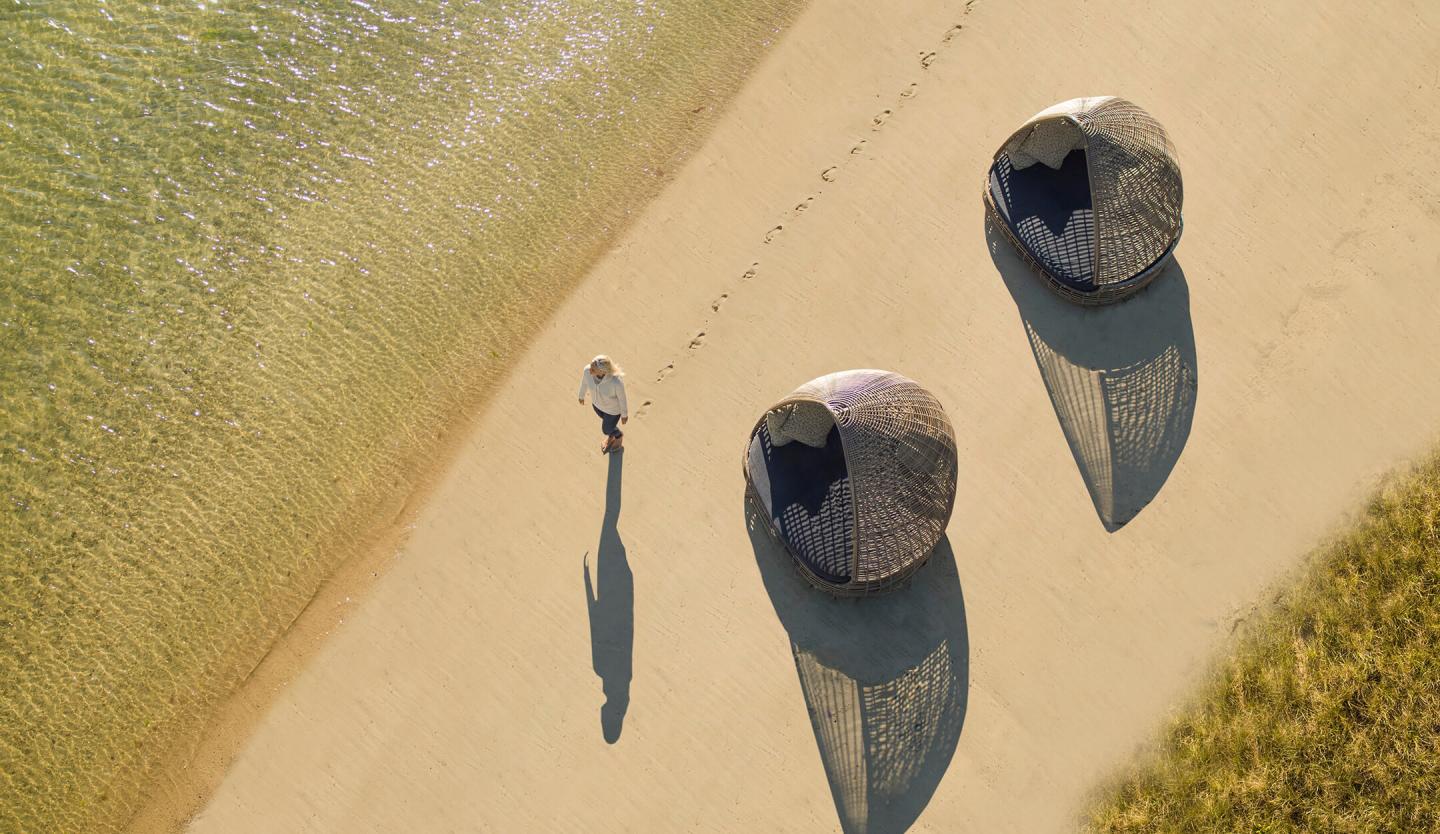 Aerial shot of wicker beach shade houses