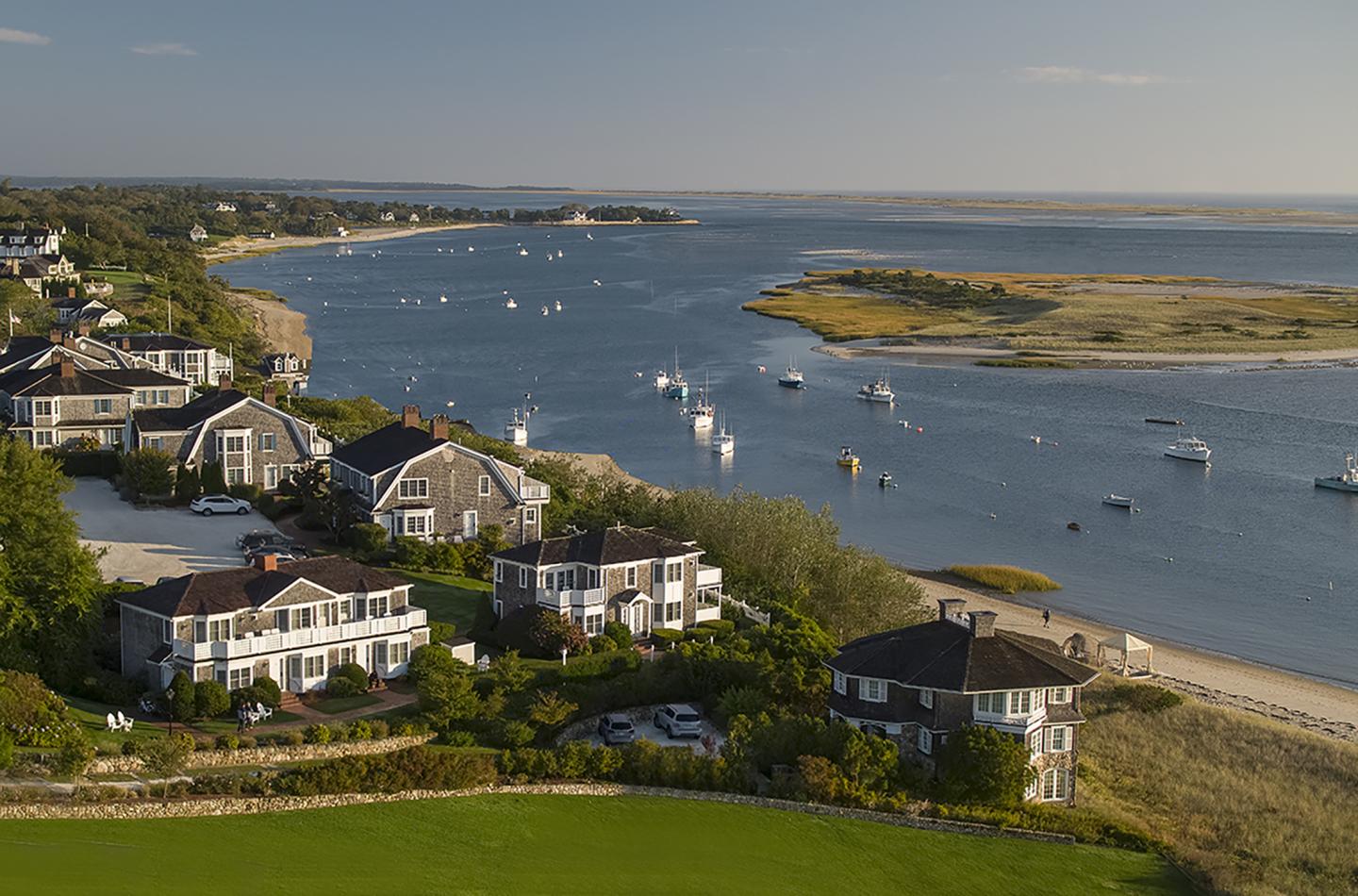 Aerial view of cottages on the bluff and the harbor at Chatham Bars Inn on cape cod