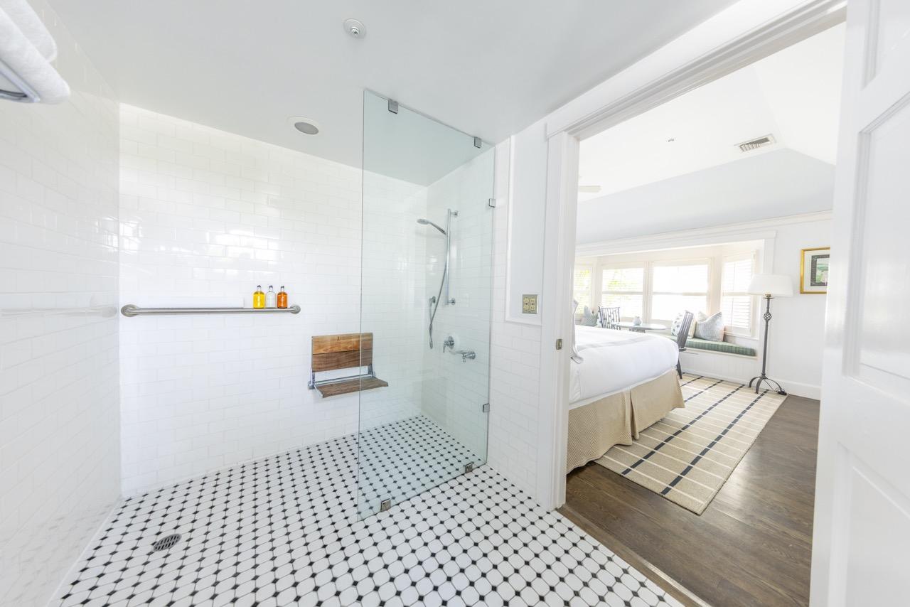 Accessible Guest room with bedroom and bathroom with roll in shower